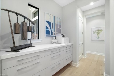 Welcome to this stunning modern residence nestled in an on Miromar Lakes Golf Club in Florida - for sale on GolfHomes.com, golf home, golf lot