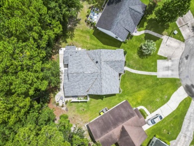 Nestled in a quiet cul-de-sac in Myrtle Beach Golf and Yacht on Heron Point Golf Club in South Carolina - for sale on GolfHomes.com, golf home, golf lot