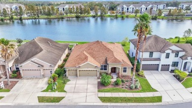 Stunning LAKE VIEWS welcome you as you enter this beautiful on The Golf Club At Bridgewater in Florida - for sale on GolfHomes.com, golf home, golf lot