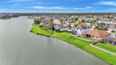 Stunning LAKE VIEWS welcome you as you enter this beautiful on The Golf Club At Bridgewater in Florida - for sale on GolfHomes.com, golf home, golf lot