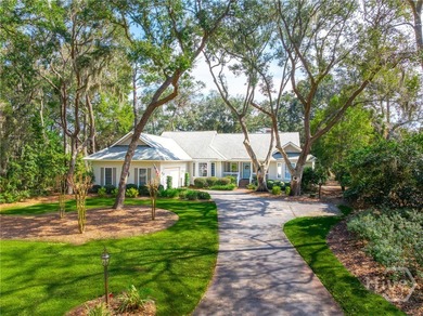 Single-level traditional home with expansive golf and lagoon on The Landings Club - Plantation in Georgia - for sale on GolfHomes.com, golf home, golf lot