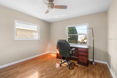 Rarely available water frontage sanctuary in Caloosa Country on Caloosa Greens Executive Golf Course in Florida - for sale on GolfHomes.com, golf home, golf lot