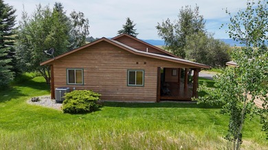 Arrive at this stunning home along the 5th fairway of Indian on Indian Springs Golf Course in Montana - for sale on GolfHomes.com, golf home, golf lot