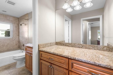 Rarely available water frontage sanctuary in Caloosa Country on Caloosa Greens Executive Golf Course in Florida - for sale on GolfHomes.com, golf home, golf lot