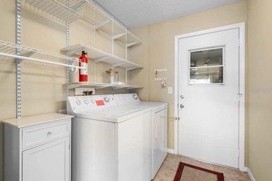 Rarely available water frontage sanctuary in Caloosa Country on Caloosa Greens Executive Golf Course in Florida - for sale on GolfHomes.com, golf home, golf lot