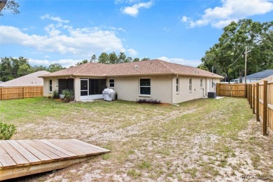 Welcome to this beautifully maintained 2024-built 3-bedroom on Citrus Springs Country Club in Florida - for sale on GolfHomes.com, golf home, golf lot