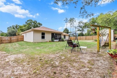Welcome to this beautifully maintained 2024-built 3-bedroom on Citrus Springs Country Club in Florida - for sale on GolfHomes.com, golf home, golf lot