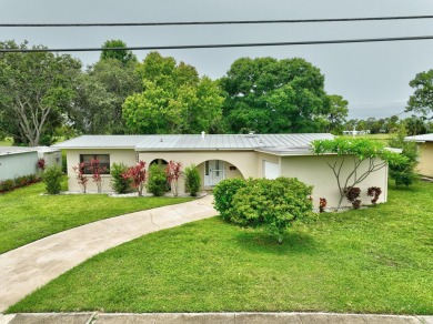 Beautiful 3 Bedroom, 2 Bathroom, 1 Car Garage Home in the on Club Med Sandpiper in Florida - for sale on GolfHomes.com, golf home, golf lot