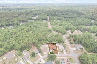 Welcome to this beautifully maintained 2024-built 3-bedroom on Citrus Springs Country Club in Florida - for sale on GolfHomes.com, golf home, golf lot