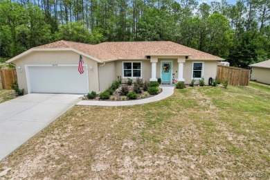 Welcome to this beautifully maintained 2024-built 3-bedroom on Citrus Springs Country Club in Florida - for sale on GolfHomes.com, golf home, golf lot