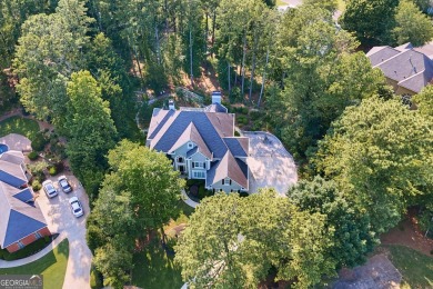 Welcome to this sweet home situated on a knoll in a quiet on The Golf Club of Georgia in Georgia - for sale on GolfHomes.com, golf home, golf lot