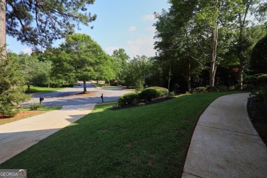 Welcome to this sweet home situated on a knoll in a quiet on The Golf Club of Georgia in Georgia - for sale on GolfHomes.com, golf home, golf lot