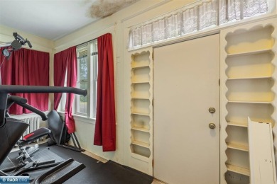 This charming 2-bedroom, 1-bath home is all about easy living on Hibbing Municipal Golf Course in Minnesota - for sale on GolfHomes.com, golf home, golf lot