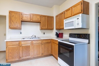 This charming 2-bedroom, 1-bath home is all about easy living on Hibbing Municipal Golf Course in Minnesota - for sale on GolfHomes.com, golf home, golf lot