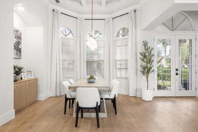 Welcome to 6922 Stanhope Place, an elegant residence tucked on University Park Country Club in Florida - for sale on GolfHomes.com, golf home, golf lot