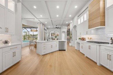 Welcome to 6922 Stanhope Place, an elegant residence tucked on University Park Country Club in Florida - for sale on GolfHomes.com, golf home, golf lot