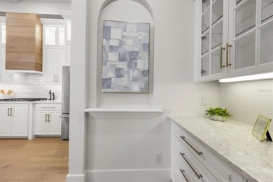 Welcome to 6922 Stanhope Place, an elegant residence tucked on University Park Country Club in Florida - for sale on GolfHomes.com, golf home, golf lot