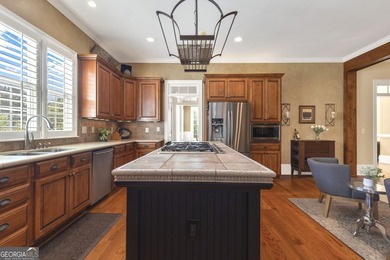 Perched at the end of a quiet cul-de-sac in sought-after on Whitewater Creek in Georgia - for sale on GolfHomes.com, golf home, golf lot