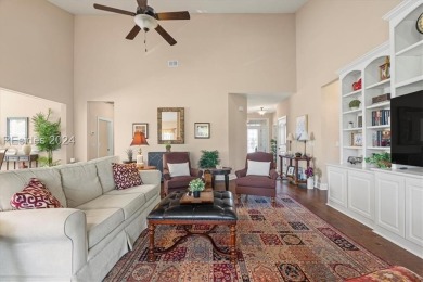 Former Model Home, situated on the 9th hole of the prestigious on Hilton Head Lakes Golf Club in South Carolina - for sale on GolfHomes.com, golf home, golf lot