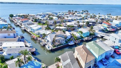 Waterfront Custom Built Home with 48 feet on a canal.  Carefree on Island Dunes Country Club in Florida - for sale on GolfHomes.com, golf home, golf lot