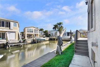 Waterfront Custom Built Home with 48 feet on a canal.  Carefree on Island Dunes Country Club in Florida - for sale on GolfHomes.com, golf home, golf lot