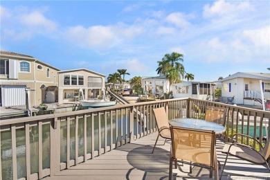 Waterfront Custom Built Home with 48 feet on a canal.  Carefree on Island Dunes Country Club in Florida - for sale on GolfHomes.com, golf home, golf lot
