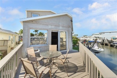 Waterfront Custom Built Home with 48 feet on a canal.  Carefree on Island Dunes Country Club in Florida - for sale on GolfHomes.com, golf home, golf lot