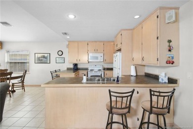 Waterfront Custom Built Home with 48 feet on a canal.  Carefree on Island Dunes Country Club in Florida - for sale on GolfHomes.com, golf home, golf lot