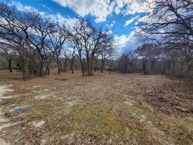 Golfers paradise, beautiful build site on hole 16 on golf course on Nocona Hills Golf Course in Texas - for sale on GolfHomes.com, golf home, golf lot