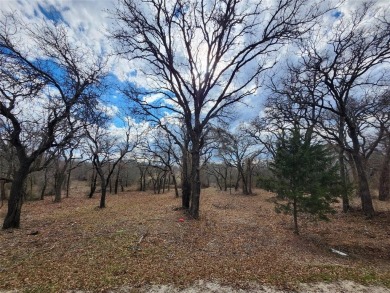 Golfers paradise, beautiful build site on hole 16 on golf course on Nocona Hills Golf Course in Texas - for sale on GolfHomes.com, golf home, golf lot