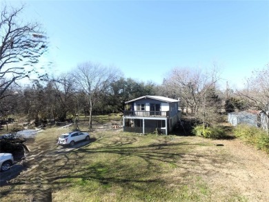 If you are looking for a lake home with character you won't want on Tawakoni Golf Course in Texas - for sale on GolfHomes.com, golf home, golf lot