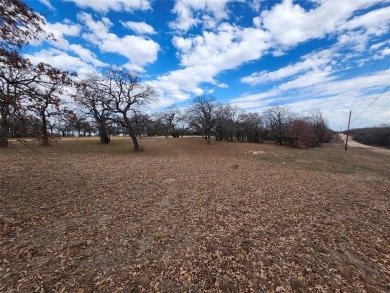 Golfers paradise, beautiful build site on hole 16 on golf course on Nocona Hills Golf Course in Texas - for sale on GolfHomes.com, golf home, golf lot