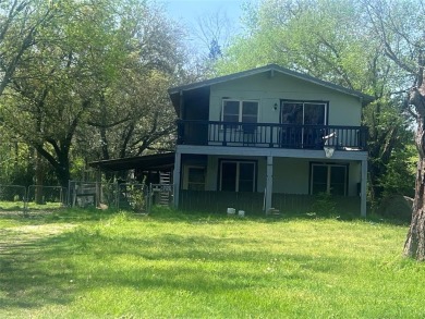 If you are looking for a lake home with character you won't want on Tawakoni Golf Course in Texas - for sale on GolfHomes.com, golf home, golf lot