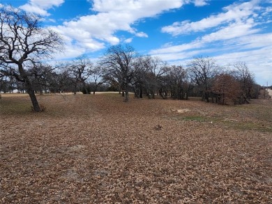 Golfers paradise, beautiful build site on hole 16 on golf course on Nocona Hills Golf Course in Texas - for sale on GolfHomes.com, golf home, golf lot