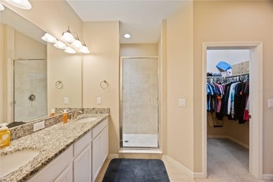 This beautifully updated second-floor home in Esplanade Lakewood on Esplanade Golf and Country at Lakewood Ranch in Florida - for sale on GolfHomes.com, golf home, golf lot