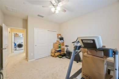 This beautifully updated second-floor home in Esplanade Lakewood on Esplanade Golf and Country at Lakewood Ranch in Florida - for sale on GolfHomes.com, golf home, golf lot