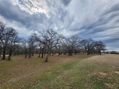 Golfers paradise, beautiful build site on hole 16 on golf course on Nocona Hills Golf Course in Texas - for sale on GolfHomes.com, golf home, golf lot