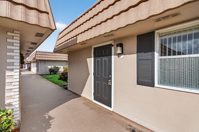 Welcome to this desirable one-story villa in the sought-after on Kings Point Golf - Executive in Florida - for sale on GolfHomes.com, golf home, golf lot