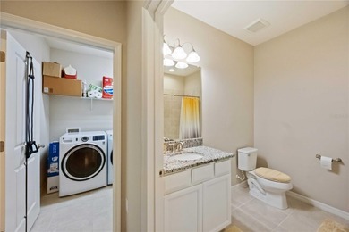 This beautifully updated second-floor home in Esplanade Lakewood on Esplanade Golf and Country at Lakewood Ranch in Florida - for sale on GolfHomes.com, golf home, golf lot