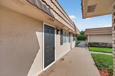 Welcome to this desirable one-story villa in the sought-after on Kings Point Golf - Executive in Florida - for sale on GolfHomes.com, golf home, golf lot