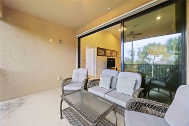 This beautifully updated second-floor home in Esplanade Lakewood on Esplanade Golf and Country at Lakewood Ranch in Florida - for sale on GolfHomes.com, golf home, golf lot