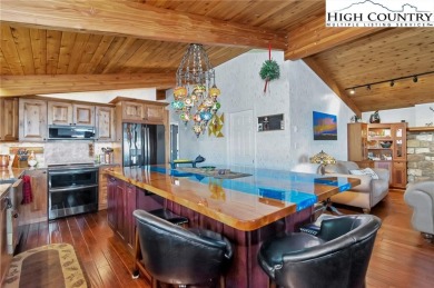 Enjoy spectacular views from 2 expanded and covered 20'x30' on Beech Mountain Club in North Carolina - for sale on GolfHomes.com, golf home, golf lot