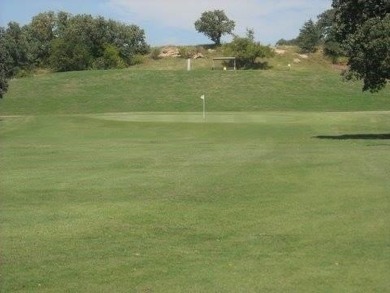 Golfers paradise, beautiful build site on hole 16 on golf course on Nocona Hills Golf Course in Texas - for sale on GolfHomes.com, golf home, golf lot