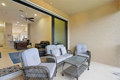 This beautifully updated second-floor home in Esplanade Lakewood on Esplanade Golf and Country at Lakewood Ranch in Florida - for sale on GolfHomes.com, golf home, golf lot