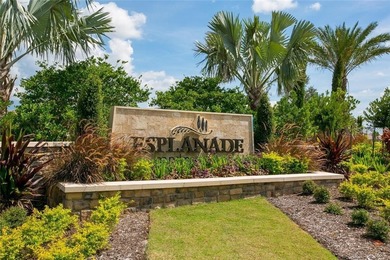 This beautifully updated second-floor home in Esplanade Lakewood on Esplanade Golf and Country at Lakewood Ranch in Florida - for sale on GolfHomes.com, golf home, golf lot