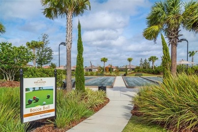 This beautifully updated second-floor home in Esplanade Lakewood on Esplanade Golf and Country at Lakewood Ranch in Florida - for sale on GolfHomes.com, golf home, golf lot