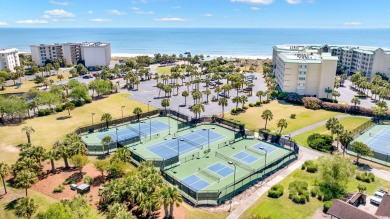 Nestled on a quiet street in the prestigious gated community of on The Reserve Golf Club at Pawleys Island in South Carolina - for sale on GolfHomes.com, golf home, golf lot
