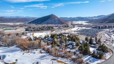 With upgrades inside and out, end row spacious townhome on a on Canyons Golf Course in Utah - for sale on GolfHomes.com, golf home, golf lot