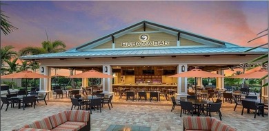 This beautifully updated second-floor home in Esplanade Lakewood on Esplanade Golf and Country at Lakewood Ranch in Florida - for sale on GolfHomes.com, golf home, golf lot