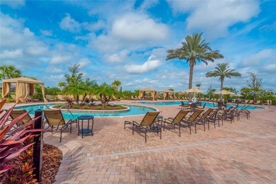 This beautifully updated second-floor home in Esplanade Lakewood on Esplanade Golf and Country at Lakewood Ranch in Florida - for sale on GolfHomes.com, golf home, golf lot